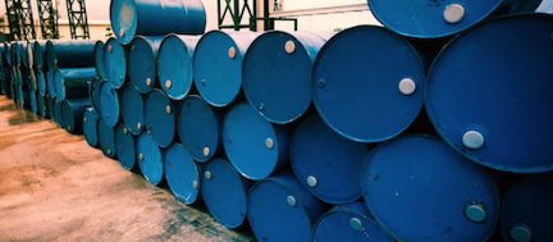 Rows of Blue Oil Drums
